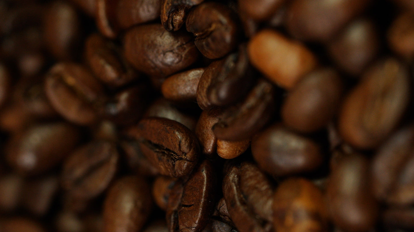 Close-up of Subatra's Coffee Arabica medium dark roast whole beans